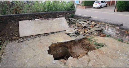 Giant Hole Opens Up In Man’s Driveway, Leading To Hidden Rooms Under His Home