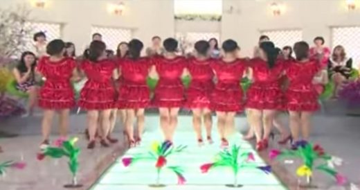 Women In Red Dresses Baffle Audience With Clever Magic Trick