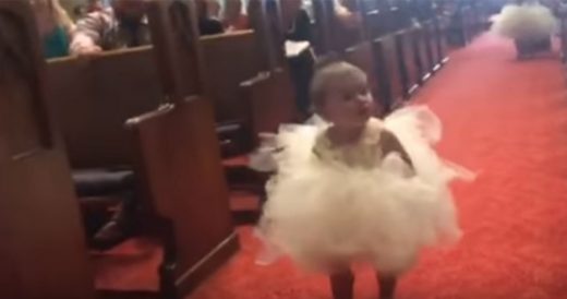 Flower Girl Walks Down The Aisle And Makes A Run For It Towards The Groom