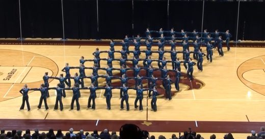 High School Dance Team Performs High Kick Routine