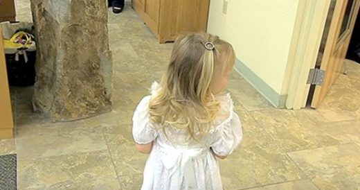 Groomsman Helps Shy Flower Girl Walk Down The Aisle