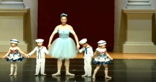 Terrified Toddler Struggles On Stage As Performance Goes On