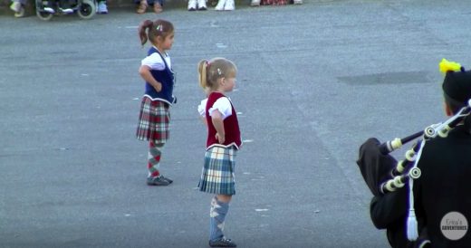 2 Tiny Scottish Dancers Perform With Bagpiper