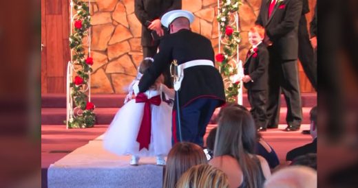 Marine Officer Helps Flower Girl Walk Down The Aisle