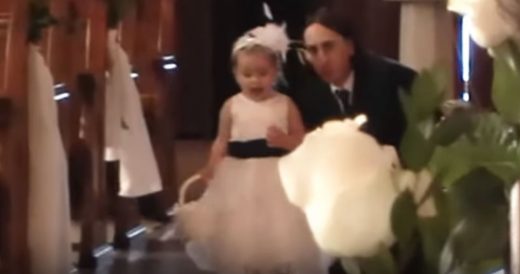 Flower Girl Calls Out To Groom When She Sees Him Down The Aisle