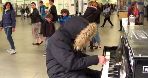 Hooded Stranger Plays Piano For Commuters