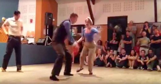 Dancer Grabs Woman’s Hand To Dance, Then Man In White Shirt Joins In For Unfor...