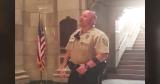 Cop Sings National Anthem In Empty Courthouse