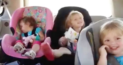 Three Little Sisters Dance In The Back Seat Of Car