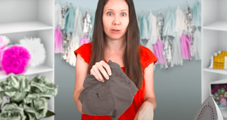 Woman Demonstrates How To Fix Holes In Clothing Using A No-Sew Technique