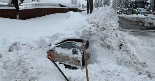 Snow Plower Slams Into Snow-Covered Car, Then He Finds A Woman Inside