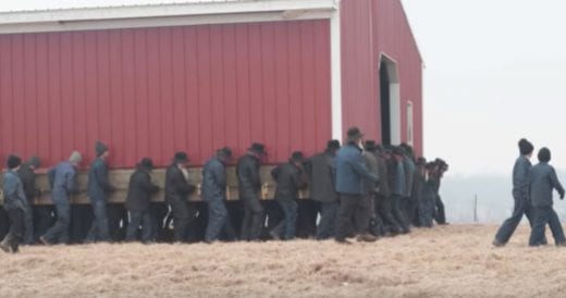 250 Men Effortlessly Pick Up A Barn And Carry It 150 Feet