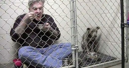 Man Eats Breakfast In Kennel With Dog After She Refuses To Eat