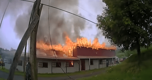 Courageous Policemen Save Frightened Horse From A Burning Barn