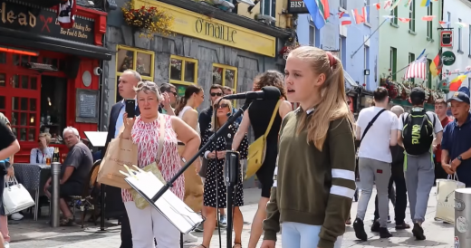 Irish Girl Catches Crowd’s Attention With Her Street Performance Of “All Of ...