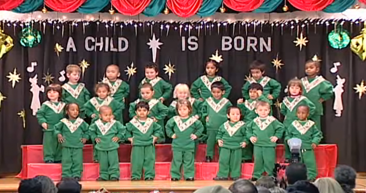 Preschoolers Entertain Audience With “Rockin’ Around The Christmas Tree” D...