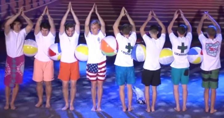 Male Beauty Pageant Contestants Perform Comedic Beach Ball Ballet