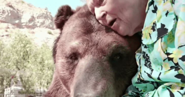 99-Year-Old Betty White Plants A Kiss On A Giant Grizzly Bear