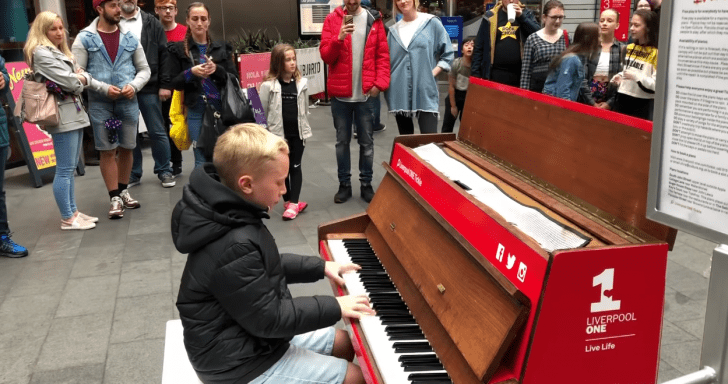 12-Year-Old Pianist Performs For Crowd On A Busy Street