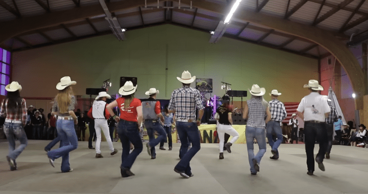 Choreographer And Crew Dress As Cowboys And Line Dance To “Footloose”