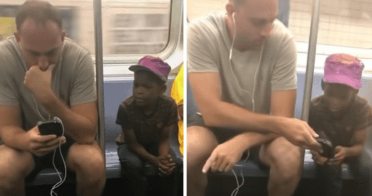 Thoughtful Man Offers His Phone To Kid Staring At Him In The Subway