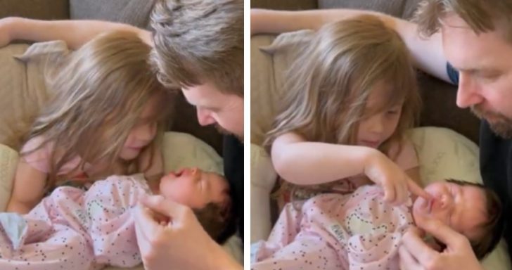 Little Girl Preciously Holds Newborn Sister In Her Arms