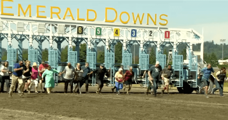 Competitive Grandparents Join A Hilarious Foot Race At A Horse Track